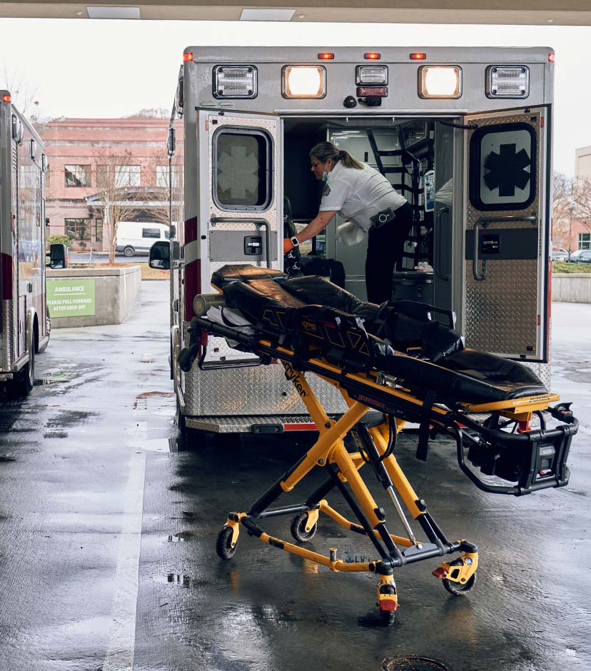 EMT preparing her truck.