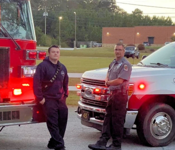 Austin Border, left, a firefighter engineer with Carroll County Fire Rescue, and his father, Chris Hancock, a critical care paramedic with West Georgia Ambulance. The father-son duo work alongside each other saving lives in Carroll County.
